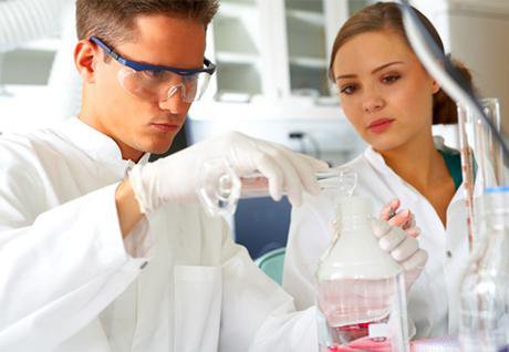 male and female researcher in laboratory